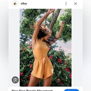 Free people movement Blissed out romper in orange size small